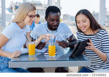 University students going out together in downtown University students going out together in downtown 33548082