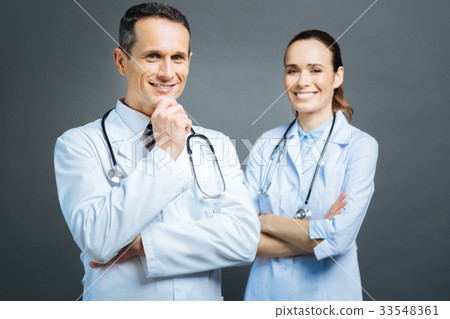 Radiant colleagues posing for camera 33548361