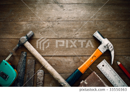 grunge tools on wooden background with empty space 33550363