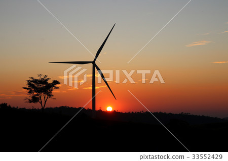 A solitary Wind Turbine silhouetted twilight time. 33552429