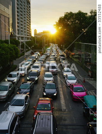 Traffic jam on road at evening Traffic jam on road at evening 33552488
