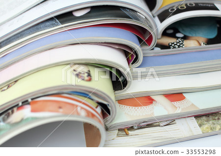 stack of magazines on white background stack of magazines on white background 33553298