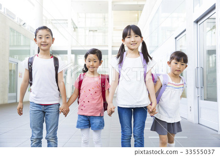 Four elementary school students Four elementary school students 33555037