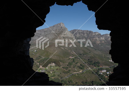 Table Mountain seen from inside a cave Table Mountain seen from inside a cave 33557595
