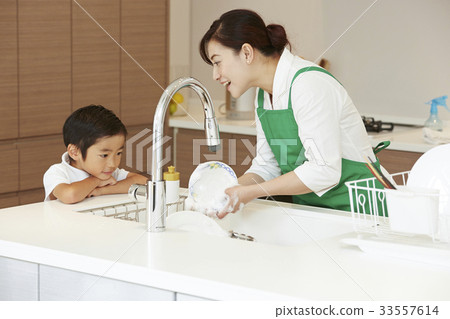 Women and children doing housework Women and children doing housework 33557614