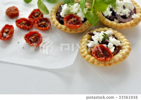 Goat cheese and roast tomato tart / goat cheese, tomato tart Goat cheese and roast tomato tart / goat cheese, tomato tart 33561938