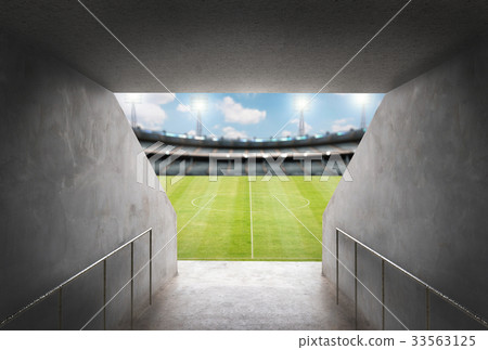 tunnel in stadium with green field tunnel in stadium with green field 33563125