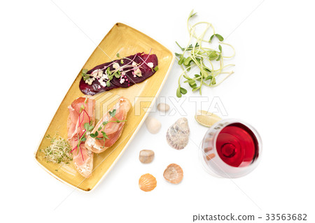 Bruschetta with Parma Ham and wine. Microgreens on Bruschetta with Parma Ham and wine. Microgreens on 33563682
