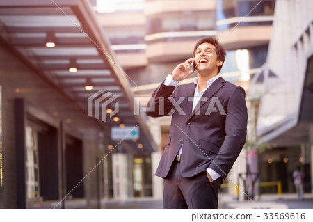 Portrait of confident businessman outdoors Portrait of confident businessman outdoors 33569616
