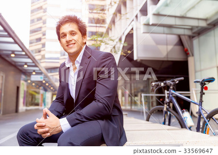 Portrait of confident businessman outdoors Portrait of confident businessman outdoors 33569647