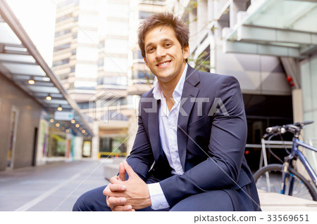 Portrait of confident businessman outdoors Portrait of confident businessman outdoors 33569651