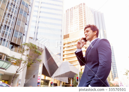 Portrait of confident businessman outdoors 33570501