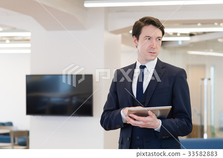 Businessman global office image Businessman global office image 33582883