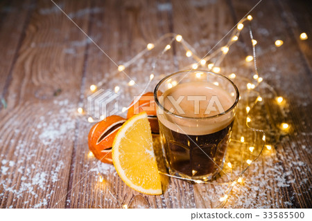 Creamy ginger coffee on the wooden table Christmas 33585500