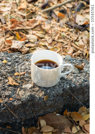 cup of coffee on rock cup of coffee on rock 33585561