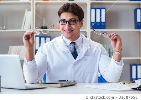 Doctor optician prescribing holding optical 33587653