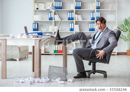 Angry businessman shocked working in the office 33588246