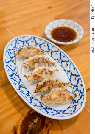Gyoza in japanese restaurant Gyoza in japanese restaurant 33590654