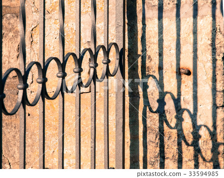 Detailed view of wrought-iron gate 33594985