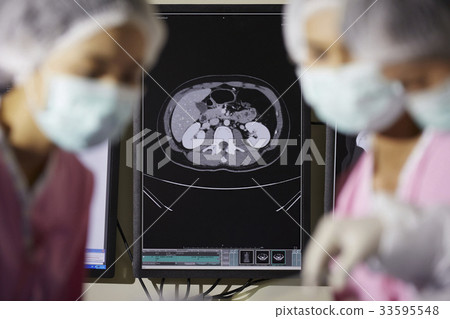The picture of a magnetic resonance imaging in an operation room 33595548