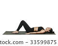 Woman exercising on yoga mat. Isolated on white. 33599875