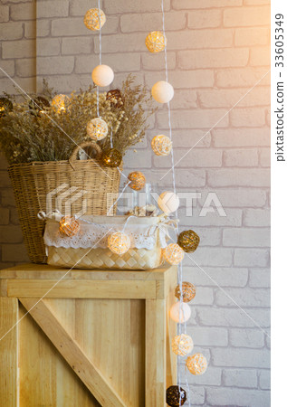 Dried flowers in a vase made of Basket of wood. Dried flowers in a vase made of Basket of wood. 33605349