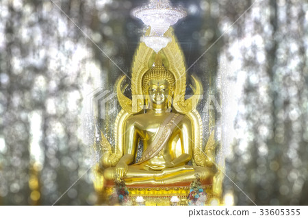 Golden Buddha statue at Cathedral glass 33605355