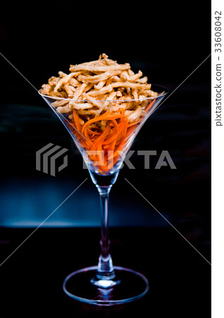 Fried calamari, Fried squid dark background Fried calamari, Fried squid dark background 33608042
