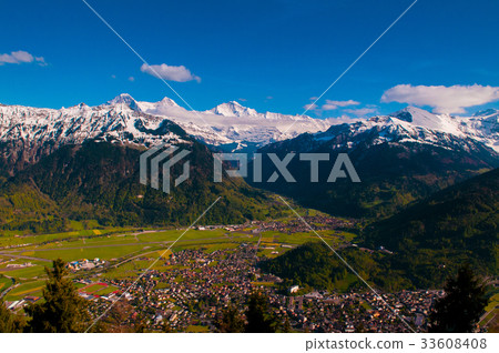 Eiger, Monch, Jungfrau peaks and Interlaken valley Eiger, Monch, Jungfrau peaks and Interlaken valley 33608408