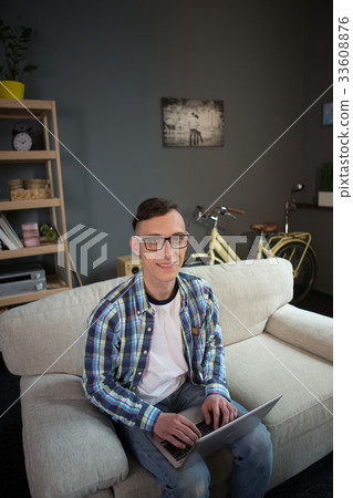 Freelancer remotely working on project from home 33608876