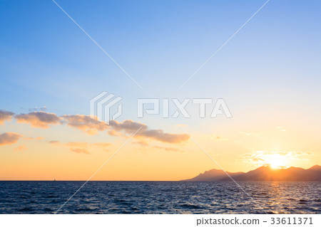 Sunset from the port of Cannes, France Sunset from the port of Cannes, France 33611371