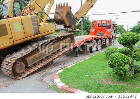 Excavators Moving to a construction site Excavators Moving to a construction site 33612978