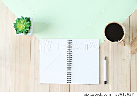 Notebook and coffee on wooden background Notebook and coffee on wooden background 33615637