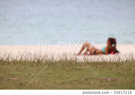 European tourists girls relaxing on the beach 33617218