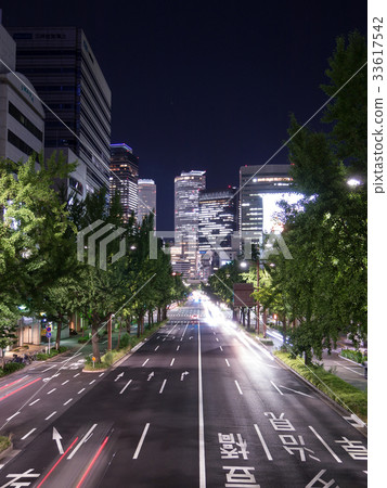 Nagoya city scenery Sakuradori Gingko lined trees and Nagoya Station buildings Nagoya city scenery Sakuradori Gingko lined trees and Nagoya Station buildings 33617542