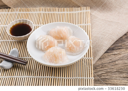 shrimp ha gow-type of steamed dumpling, dim sum. 33618230
