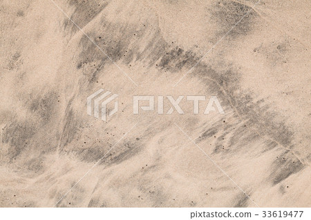 Wet shore sand background photo texture 33619477