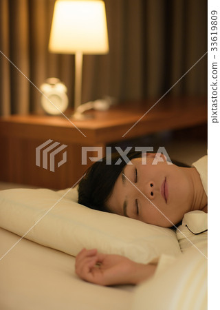 A young woman sleeping A young woman sleeping 33619809