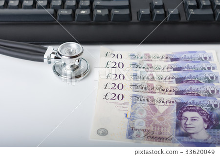 Stethoscope,money, keyboard on white. 33620049