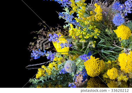 bouquet of fresh wildflowers on black background bouquet of fresh wildflowers on black background 33620212