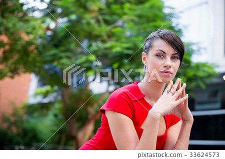 Portrait of businesswoman outside 33624573
