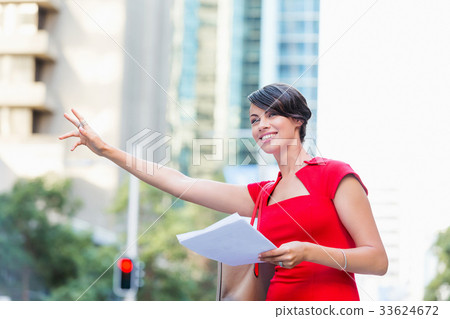 Portrait of businesswoman outside 33624672