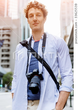 Male tourist in city Male tourist in city 33625539