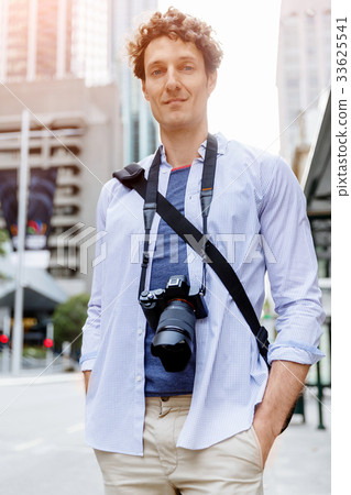 Male tourist in city Male tourist in city 33625541