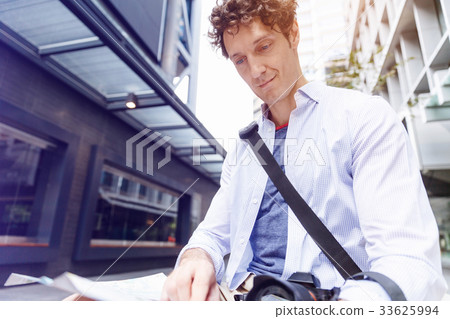 Male tourist in city Male tourist in city 33625994