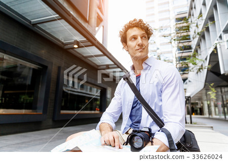 Male tourist in city Male tourist in city 33626024