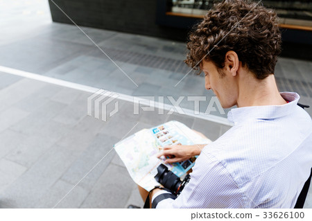 Male tourist in city Male tourist in city 33626100