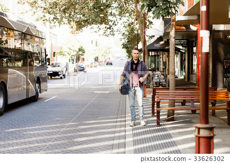 Male tourist in city Male tourist in city 33626302