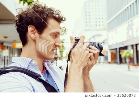 Male photographer taking picture Male photographer taking picture 33626878