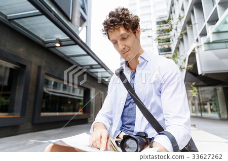 Male tourist in city Male tourist in city 33627262